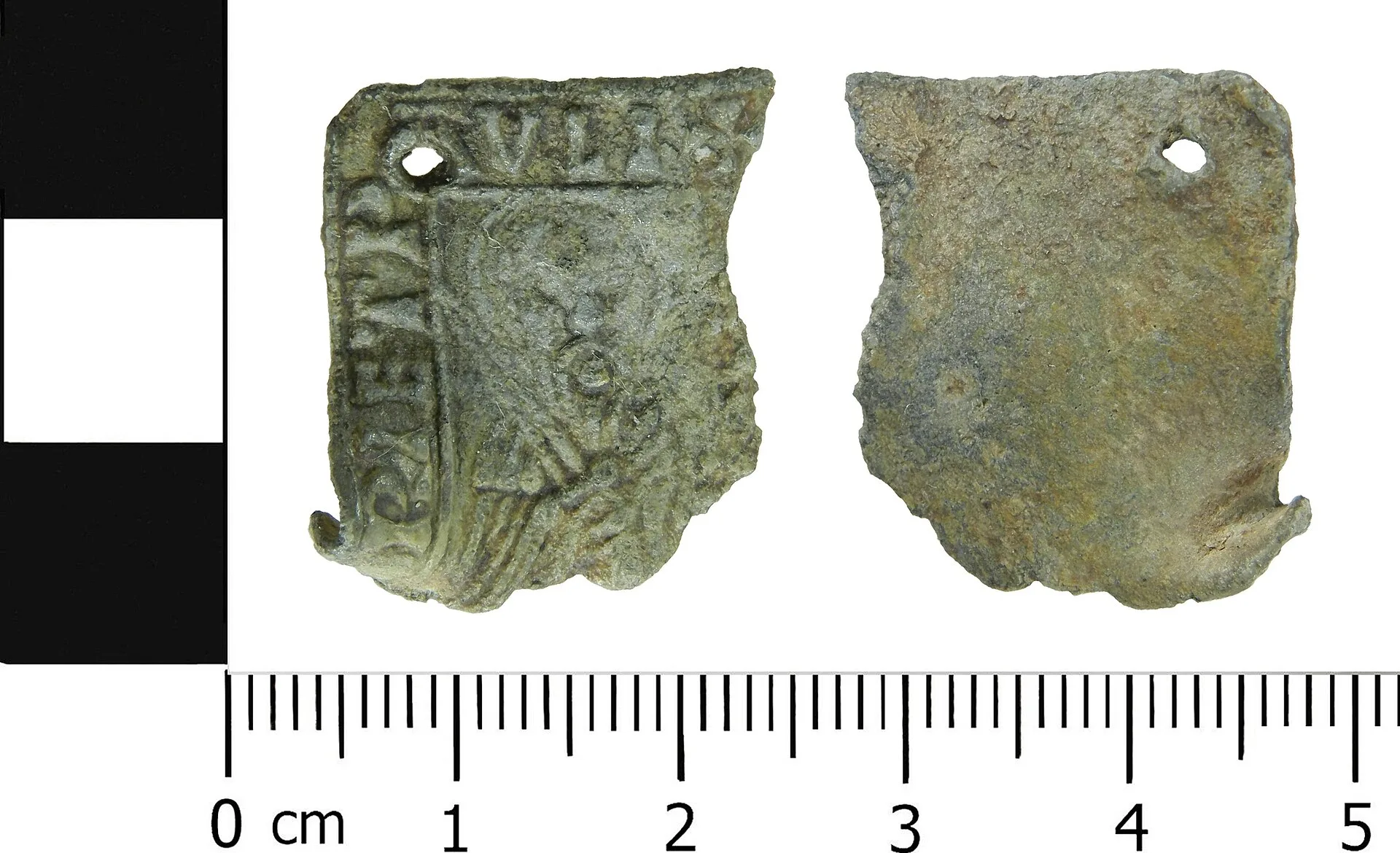 Medieval lead alloy, or lead, pilgrim badge. It consists of a the top left corner of a rectangular plaque and is missing the stitching ring that would have projected outwards from the plaque. It originally depicted SS Peter and Paul within a border inscribed [SIGNA APOSTOLORVM PET]RIETP AVLI +. The. The complete workflow for machine identification, badge to written finding