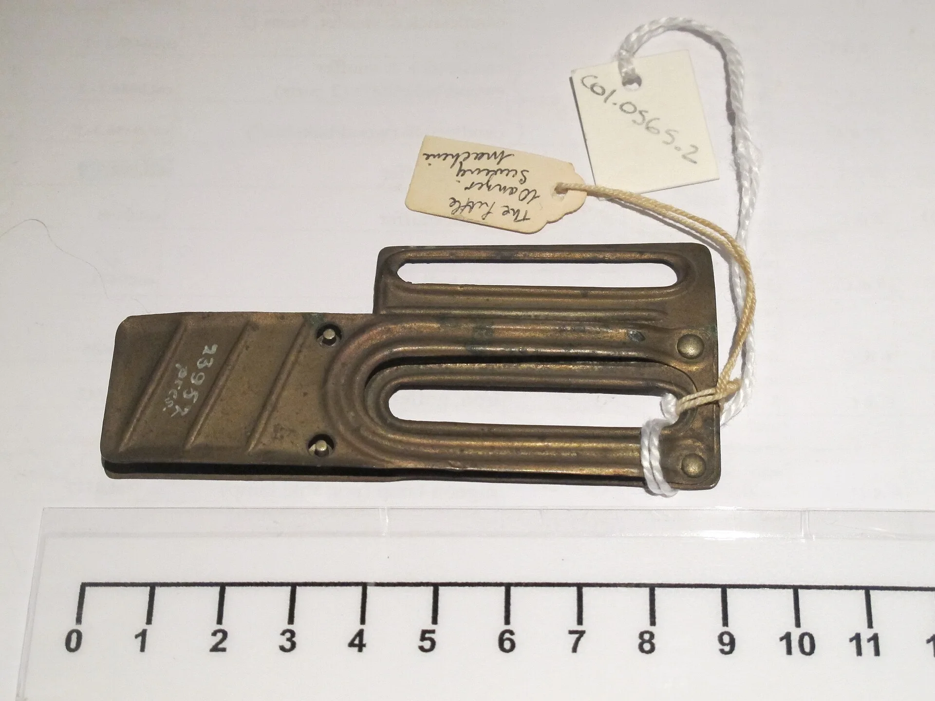 Sewing machine; "Little Wanzer"; brought to New Zealand 60 years ago (as of 1938); also box of attachments and instruction book. Reading patent markings before buying sewing machine attachments in 2027